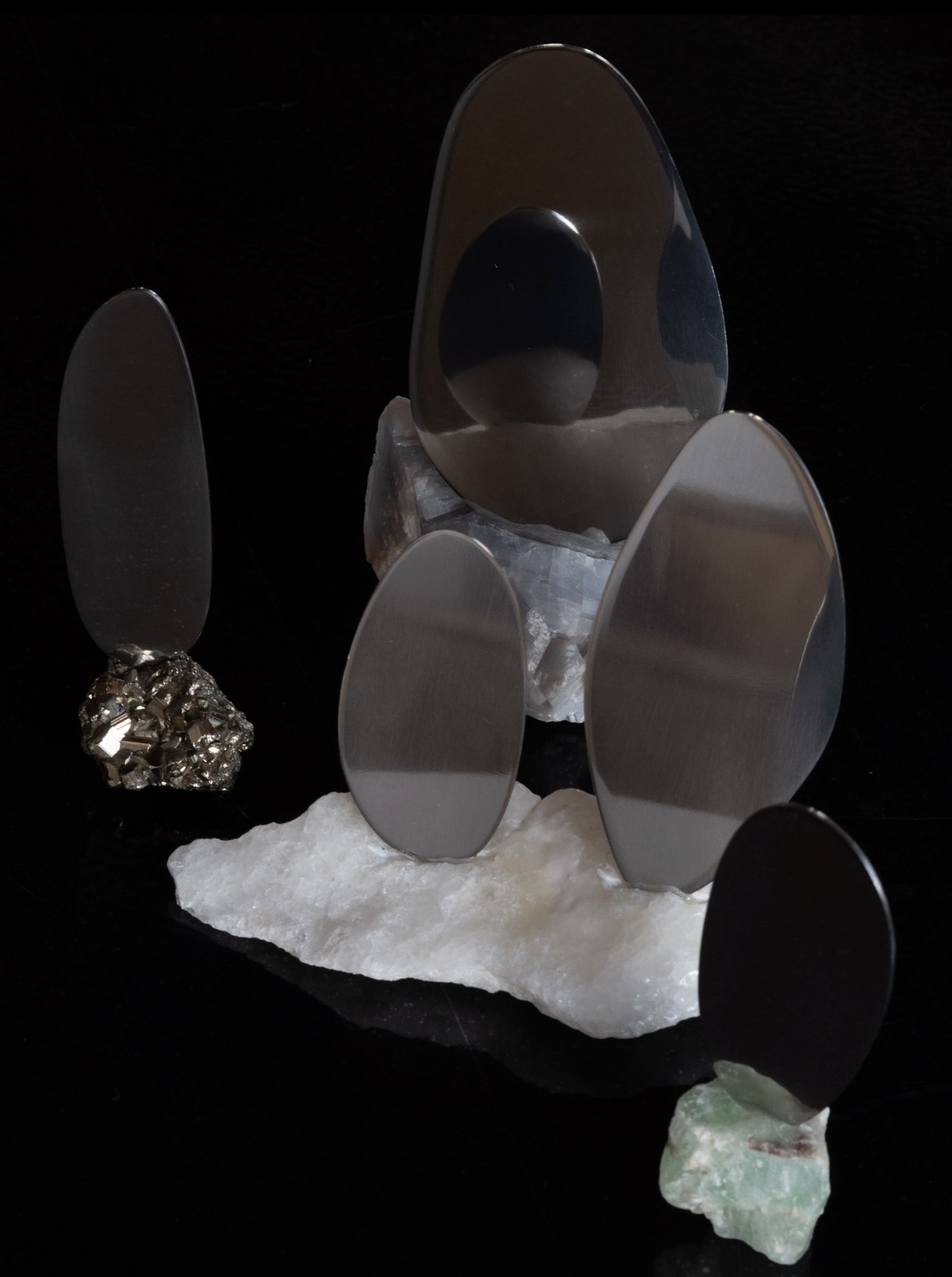 Mirror maquettes on raw stone in the studio